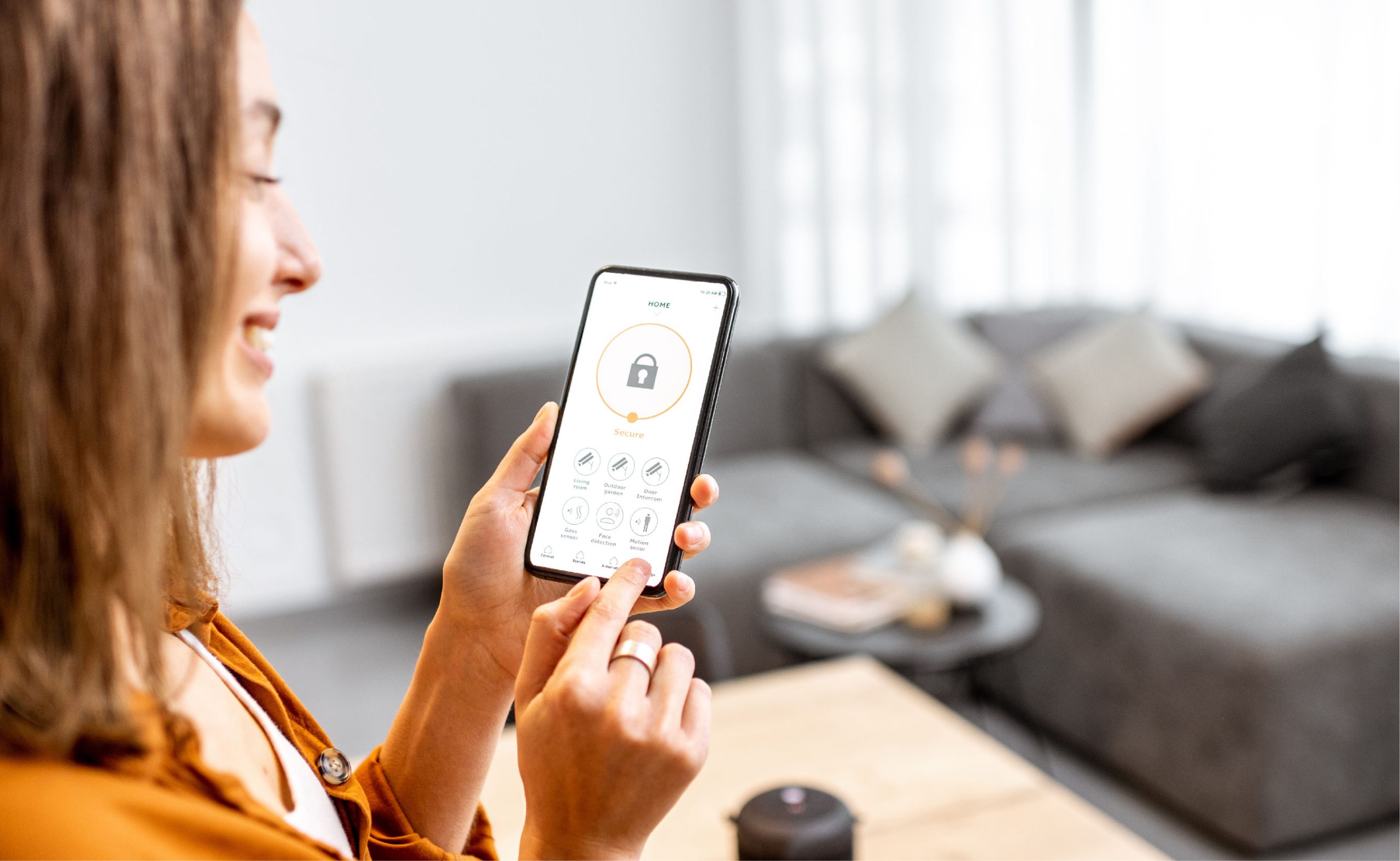 homeowner using smart home phone app